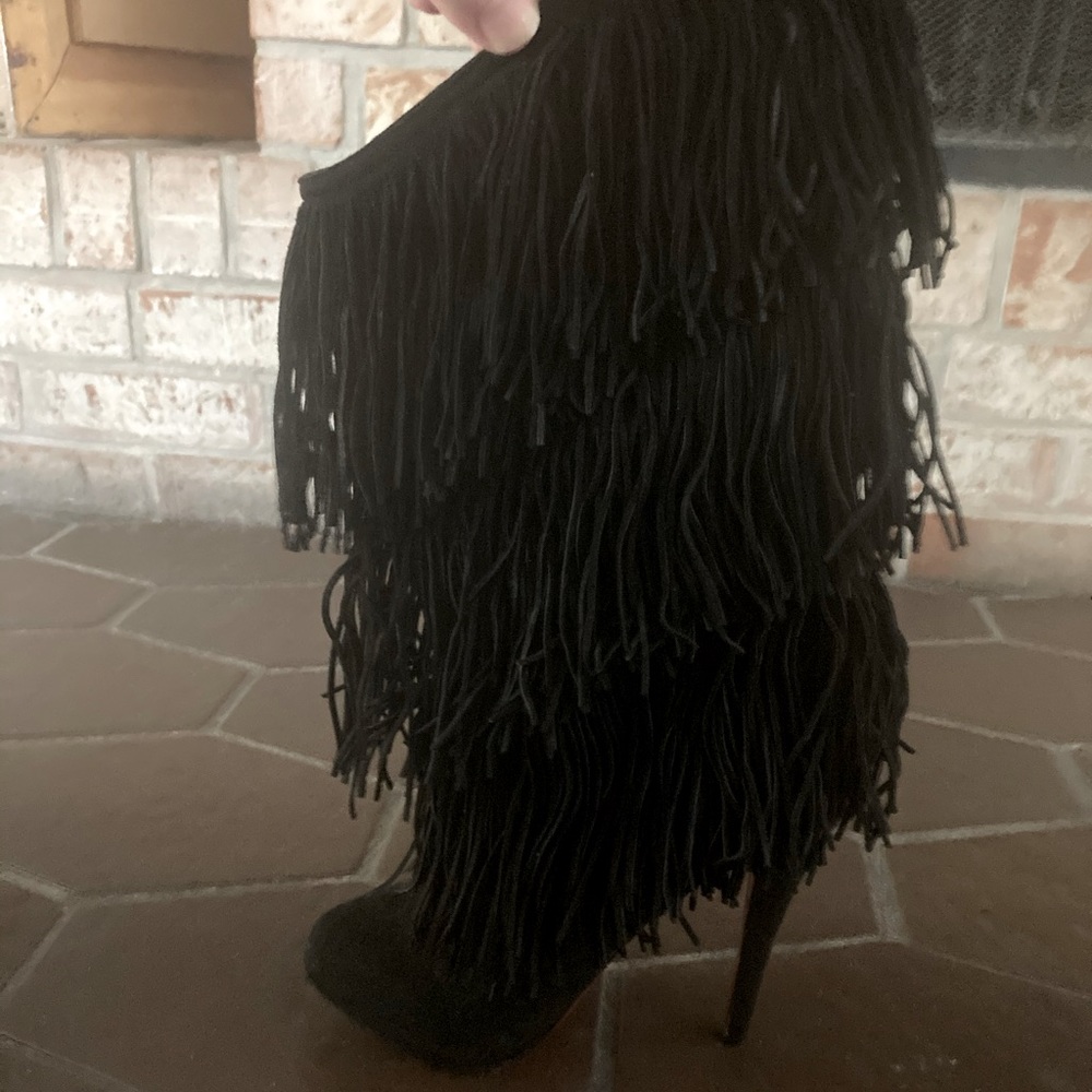 Christian Louboutin tassel boots